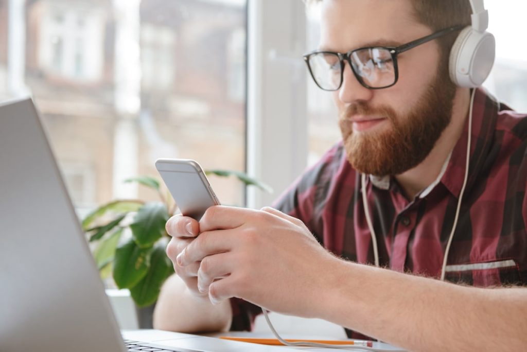 student looking at phone