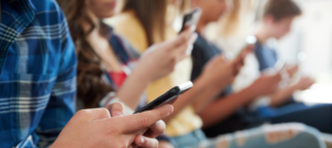 Students holding phones