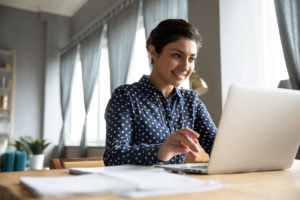 College student looking at computer