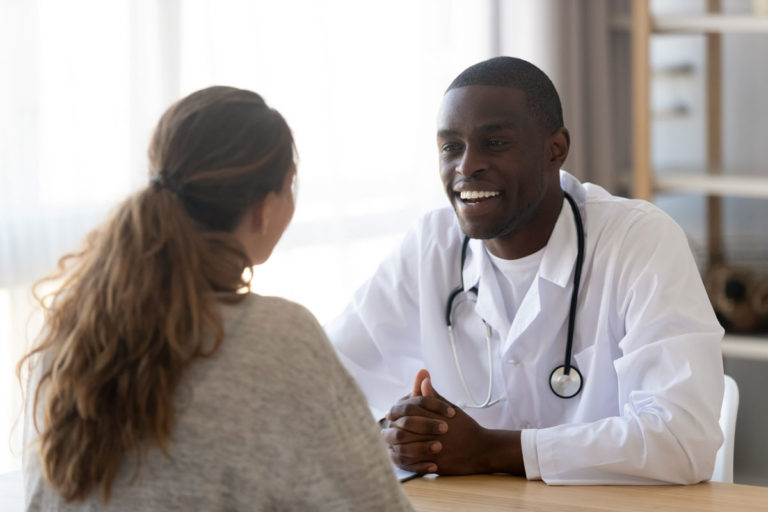 Doctor talking to student, continuity of care