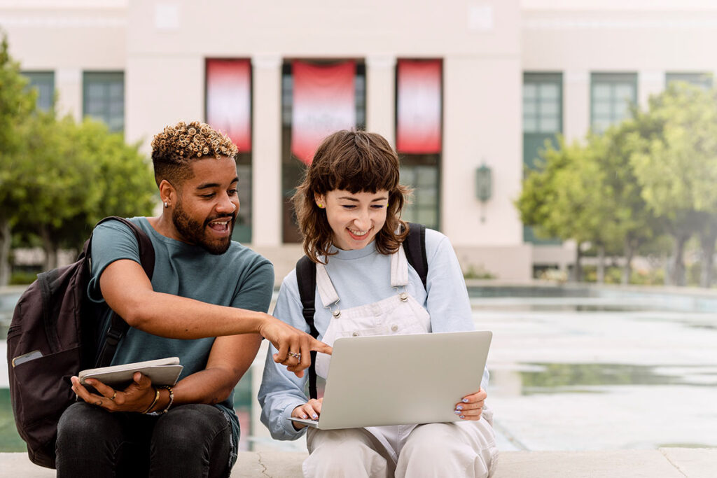 Students studying together outside