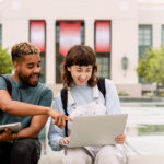 Students studying together outside