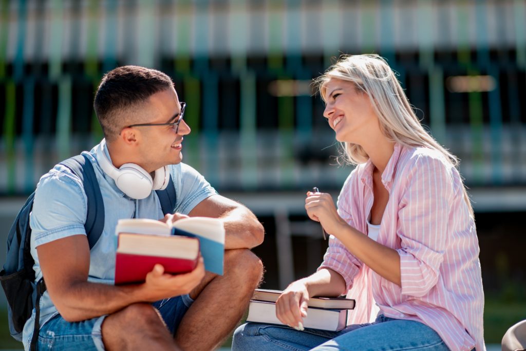 Students sitting on campus steps