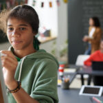 Child works in an art studio