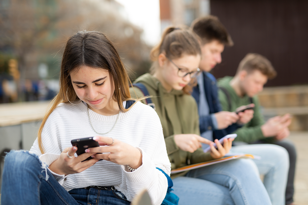 K12 student sitting on steps